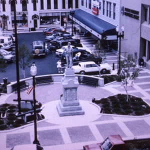 The current downtown square, with a cement circle surrounding the Civil War Statue. 