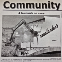 An excerpt from the daily record with the headline "A landmark no more" and a photograph of the Freelander's store being demolished. 