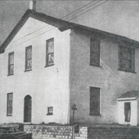 Photograph of a house from 1955. 