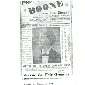 A poster advertising "Boone the Great: the Original Boy Phenomenon" at the Wayne County Fair. 