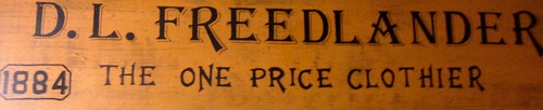 Sign that says "D.L. Freelander, the one price clothier, 1884" 