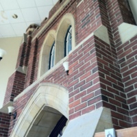 Interior lobby of Trinity United Church, where the original facade still stands. 