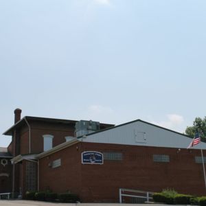 A side view of a one story brick building which is the Eagle Lodge 