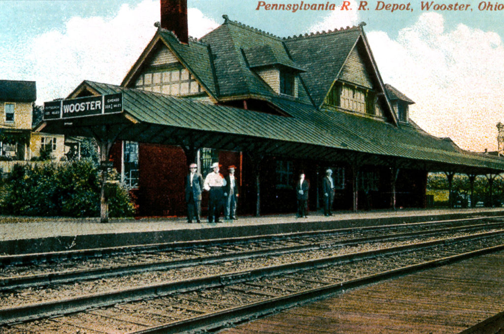 A postcard displaying the Wooster train station. 