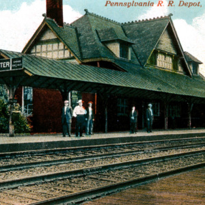 A postcard displaying the Wooster train station. 