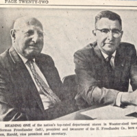 A clip from a newspaper that shows a photograph of Herman Freelander and his son, Harold. 