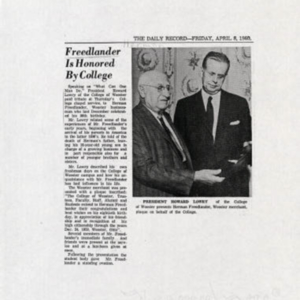 An excerpt from a newspaper that has a photograph of Herman Freelander and President Lowry standing together with the headline "Freelander is honored by College" 