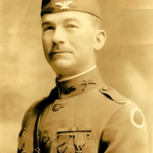 Portrait of a man wearing a military uniform and medals. 