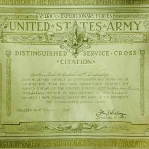 A certificate that says "United States Army: Distinguished service, cross citation" 